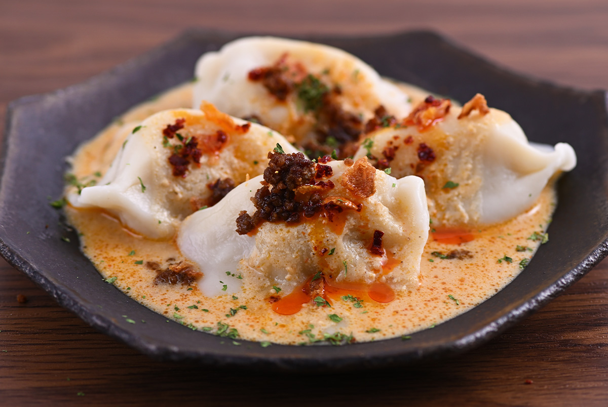 まるで担担麺！？
                            もっちり！担担ソース水餃子